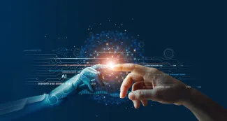 Hands of robot and human touching